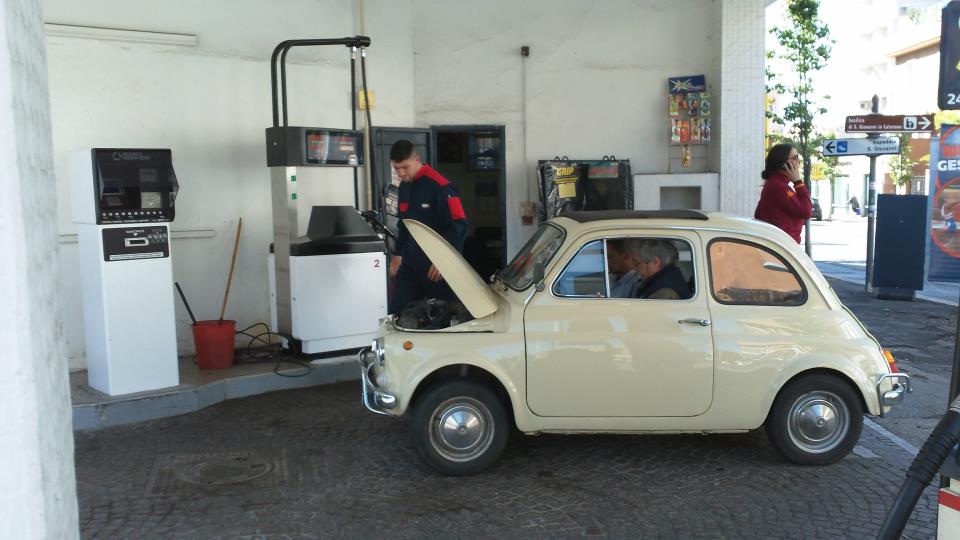 Vintage Fiat 500 at the gas station with three men!