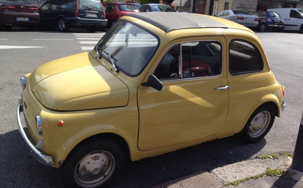 Yellow Vintage Fiat 500 - Corner of the White Fiat 500