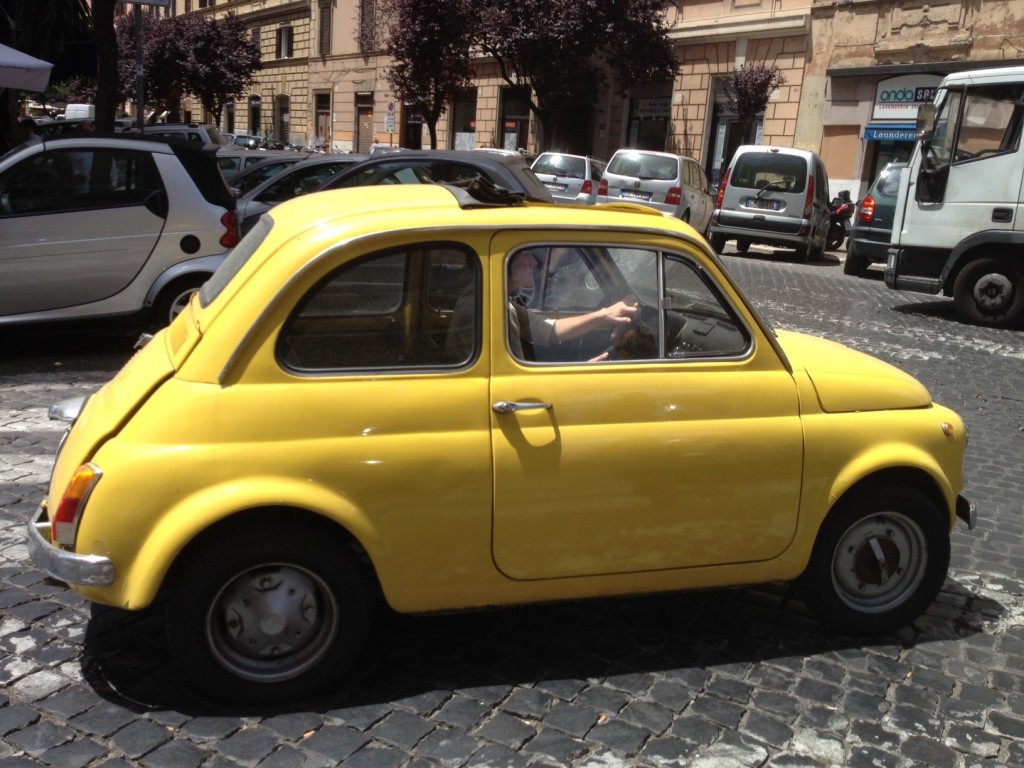 Yellow Vintage Fiat 500 - Driving past me